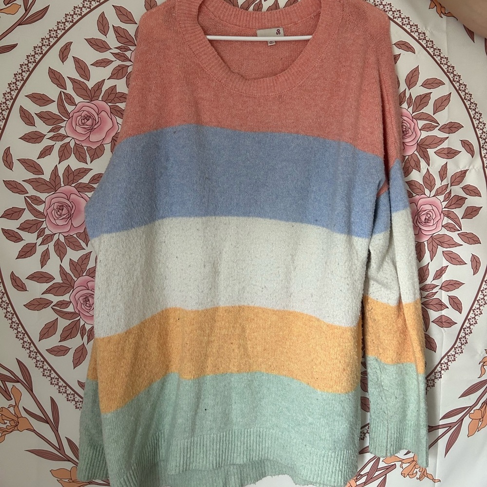 Oversized style, xl sized sweater, with pastel rainbow stripes. :)